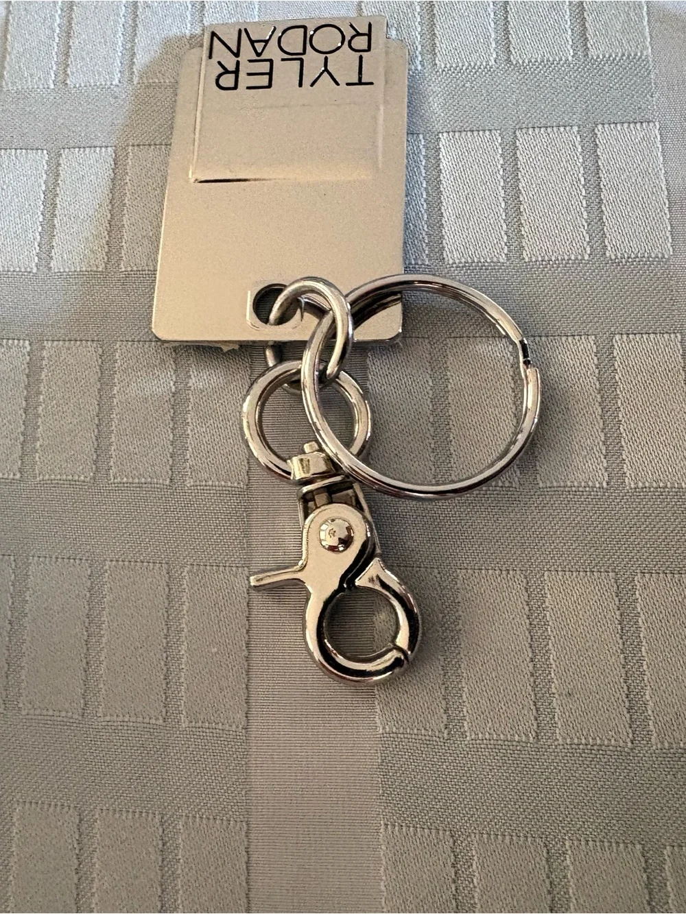 Tyler Rodan Silver Branded Metal Key chain
